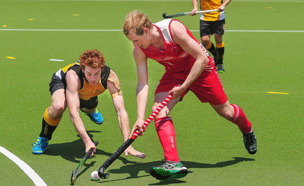 WORKING HARD: Easts player Kyle Sippel (left) tackles Norths striker Anthony Woodward during their Tiger Turf Cup game on Saturday. Norths won 5-3. WORKING HARD: Easts player Kyle Sippel (left) tackles Norths striker Anthony Woodward during their Tiger Turf Cup game on Saturday. Norths won 5-3.